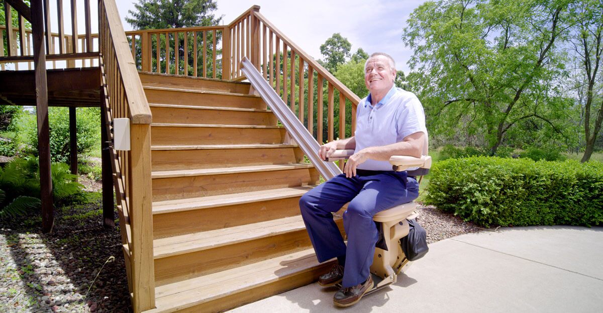 Man in outdoor stairlift