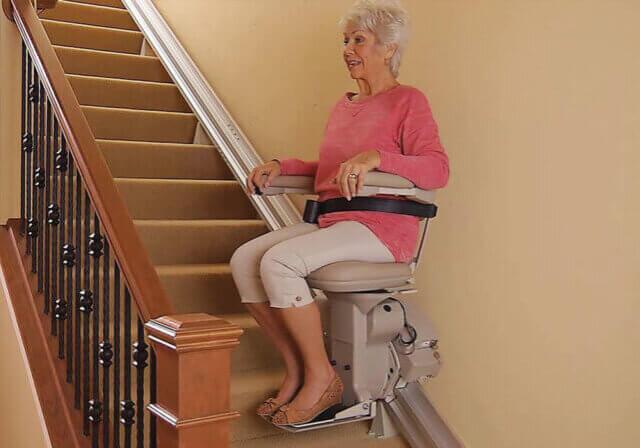 Woman on Bruno Elite stairlift