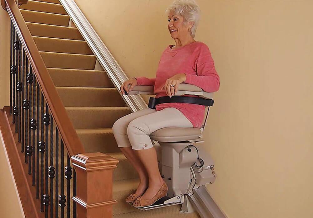 Woman on Bruno Elite stairlift