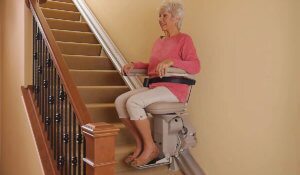 Woman on Bruno Elite stairlift