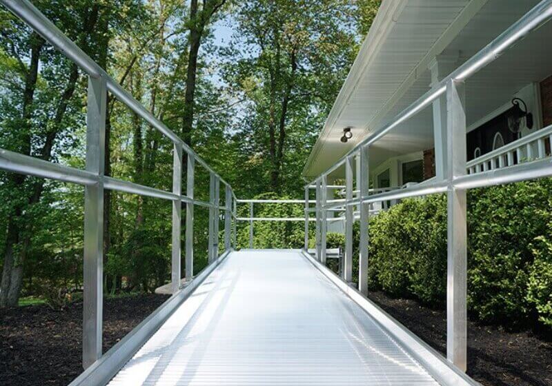 residential wheelchair ramp in front of a home